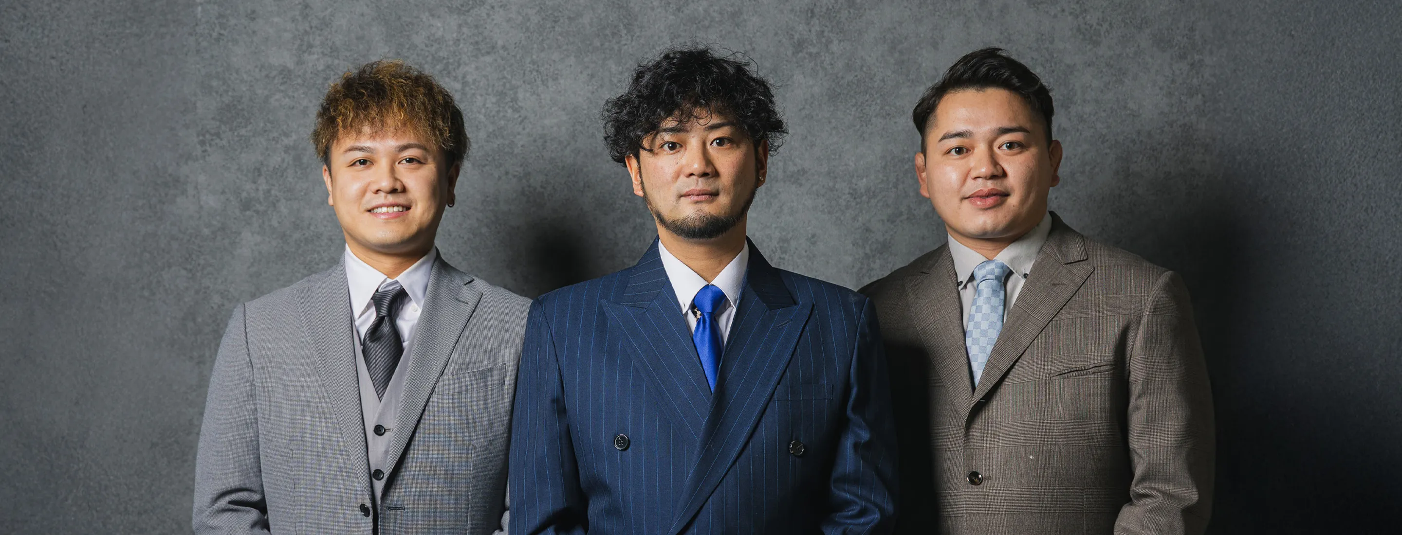 代表メンバー3人が横並びになっている写真